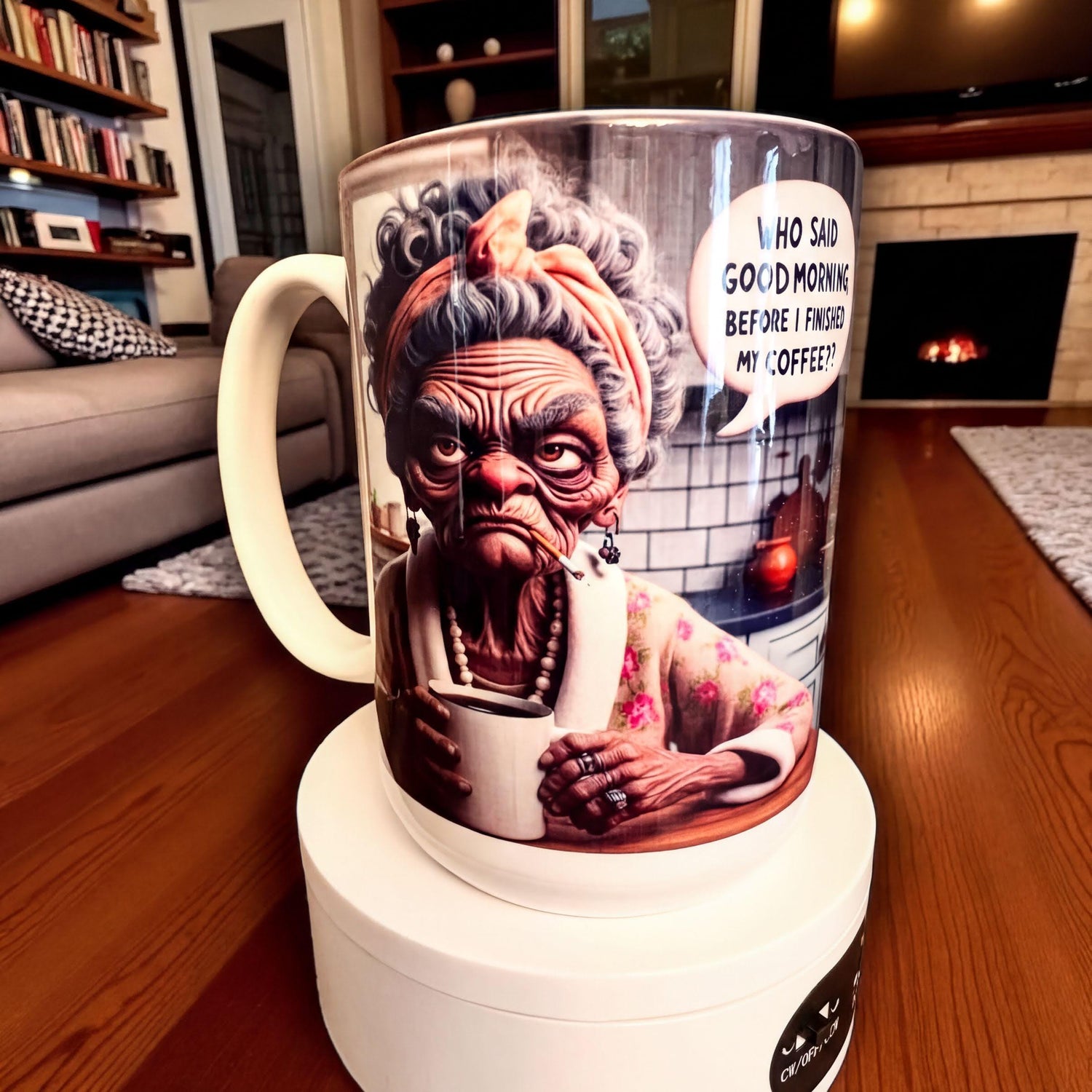 A mug featuring an animated character with a speech bubble saying "Who said good morning before I finished my coffee?"