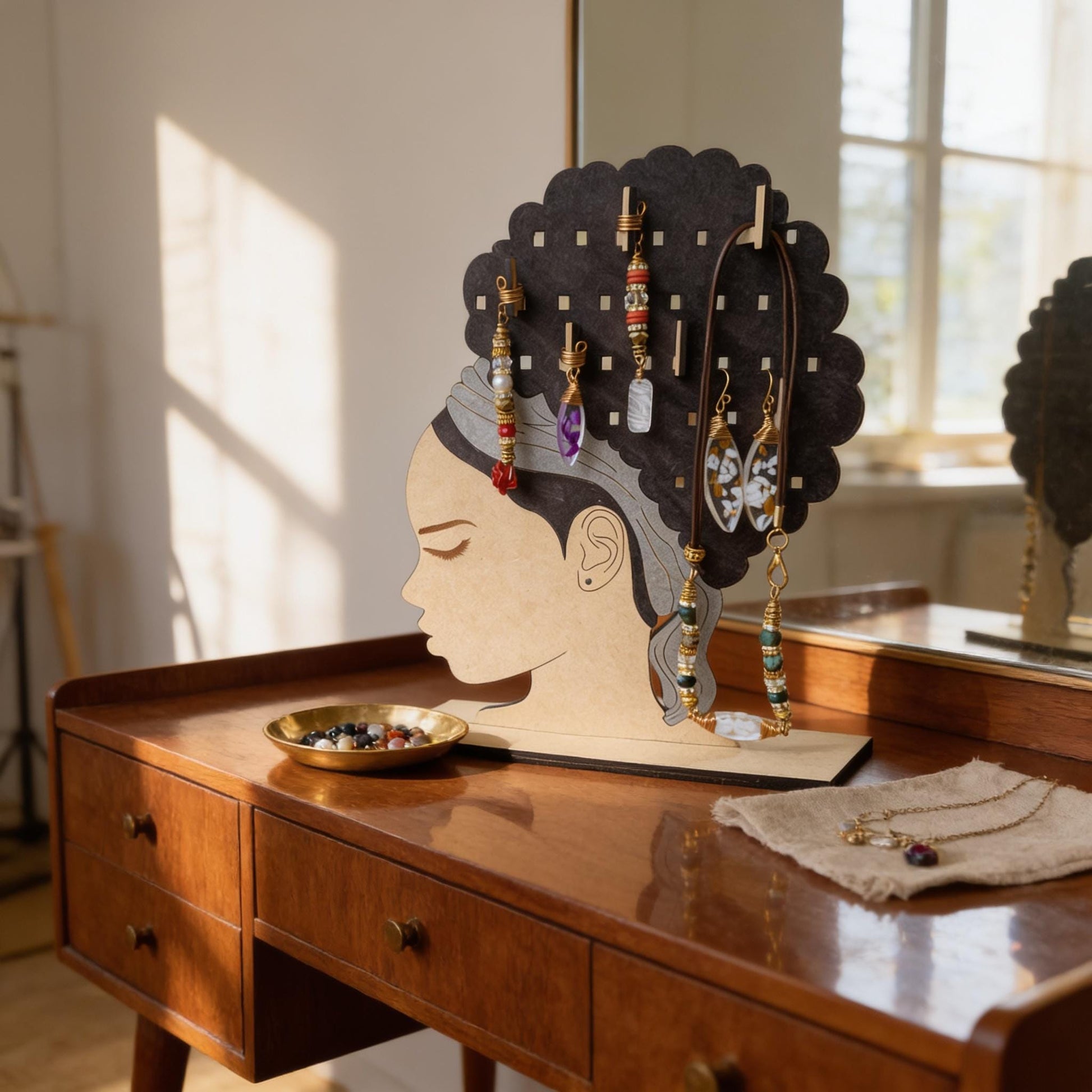 A wooden jewelry stand with a woman's head silhouette and various earrings displayed on it, placed on a wooden dresser.