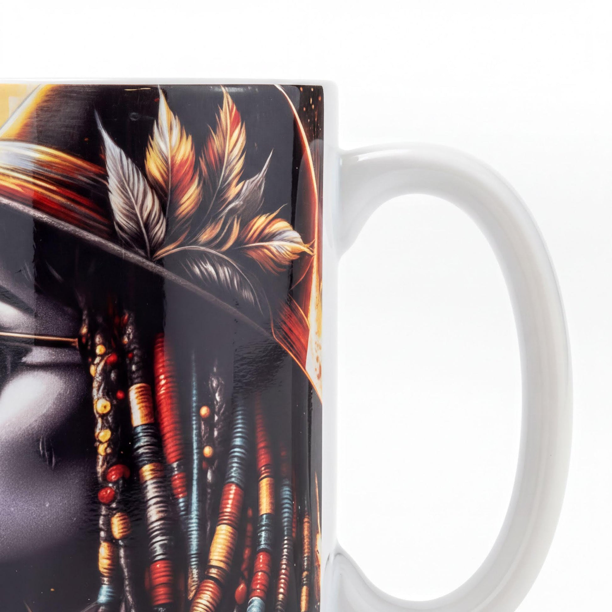 A close-up view of a white mug with a colorful, intricate design featuring feathers, beads, and a black background.