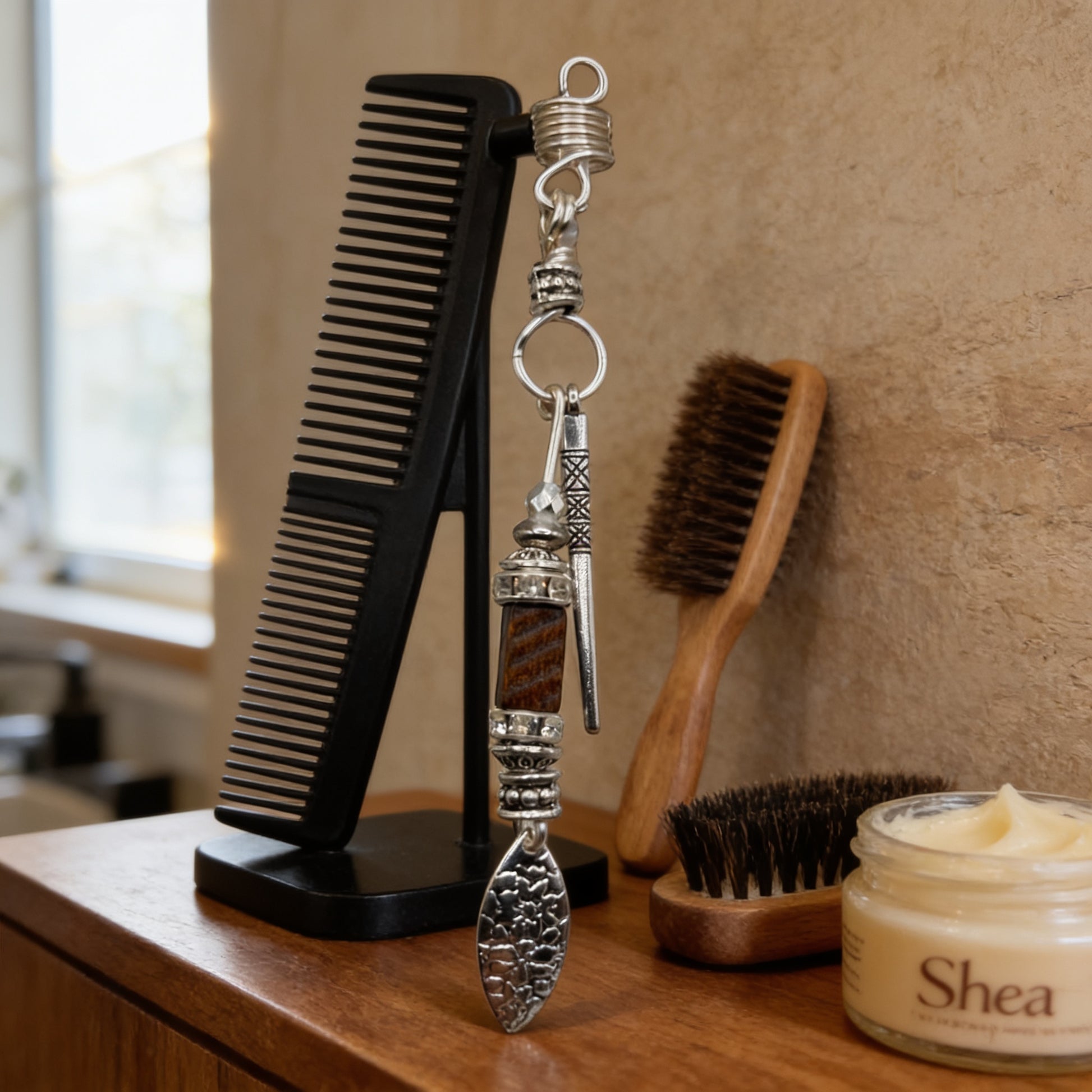 a collection of grooming tools and personal care items arranged on a wooden surface.