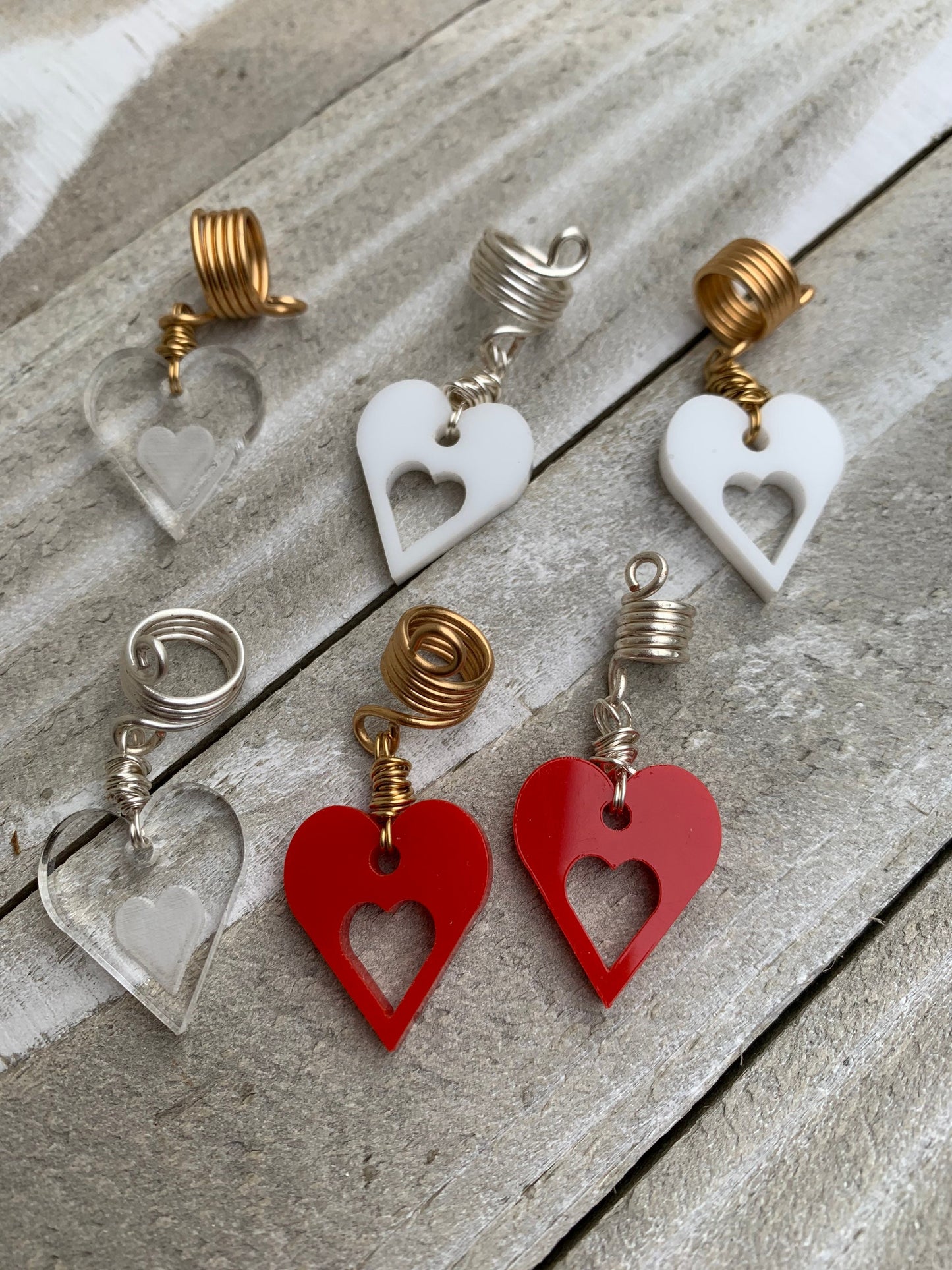 Design's by Cyere Loc and Braid Heart Accent  piece.