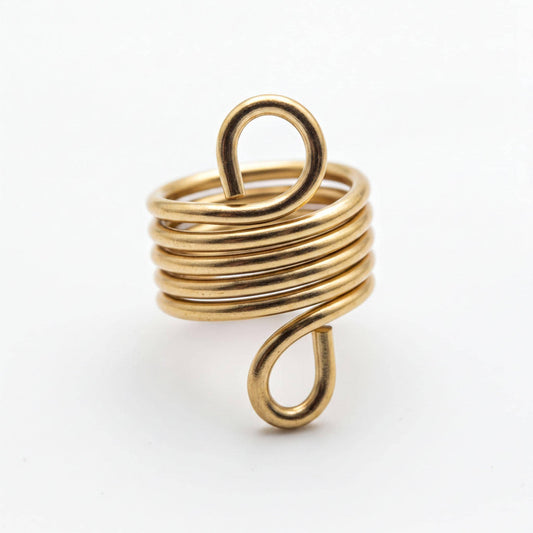 A gold-colored spiral ring with a twisted, coiled design.