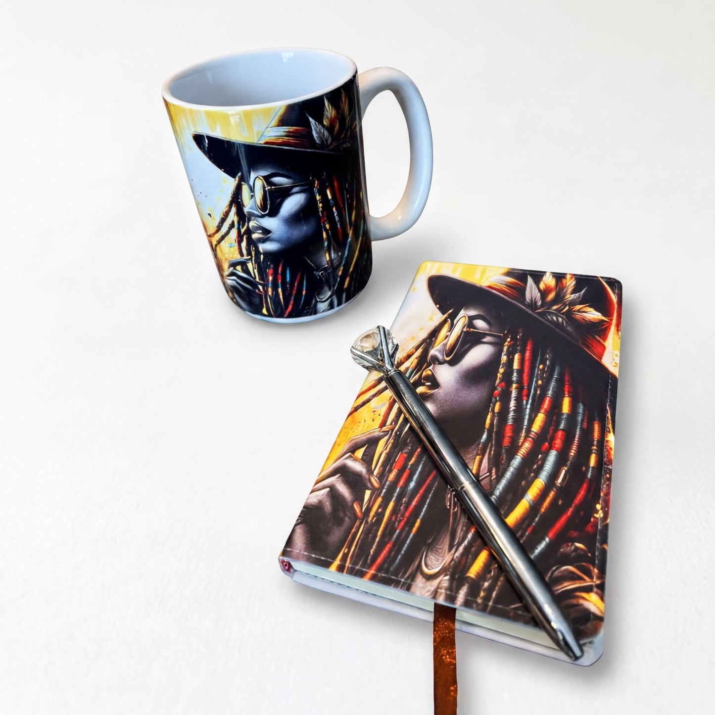 a mug and a notebook with a woman's face printed on them, placed on a white surface.