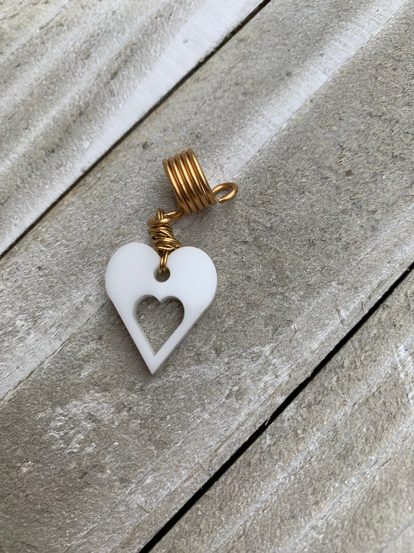 Design's by Cyere Loc and Braid Heart Accent  piece.