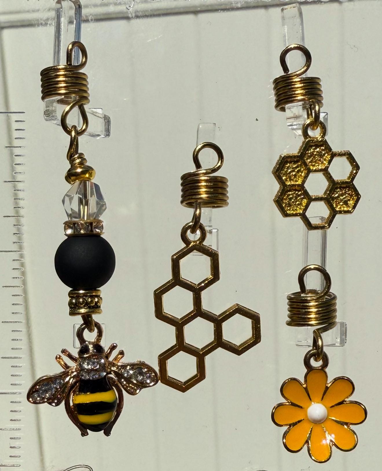 Designs by Cyere – “Bee-You-tiful Blossoms” Loc & Braid Jewelry Set
