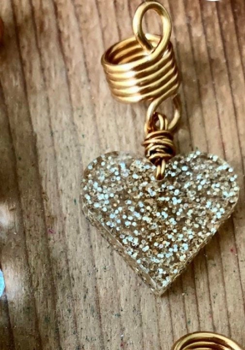 Design's by Cyere Loc and Braid Heart Accent  piece.