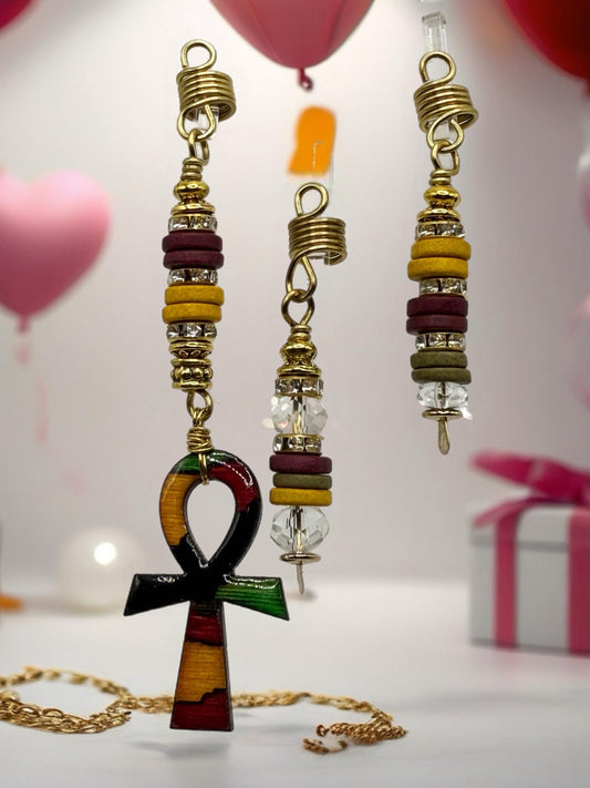 a collection of colorful and ornate jewelry, including necklaces and earrings, suspended from the ceiling. The jewelry appears to be made of beads and metal, creating a vibrant and eye-catching display.